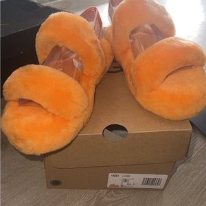 Little girl orange Ugg slippers size 2